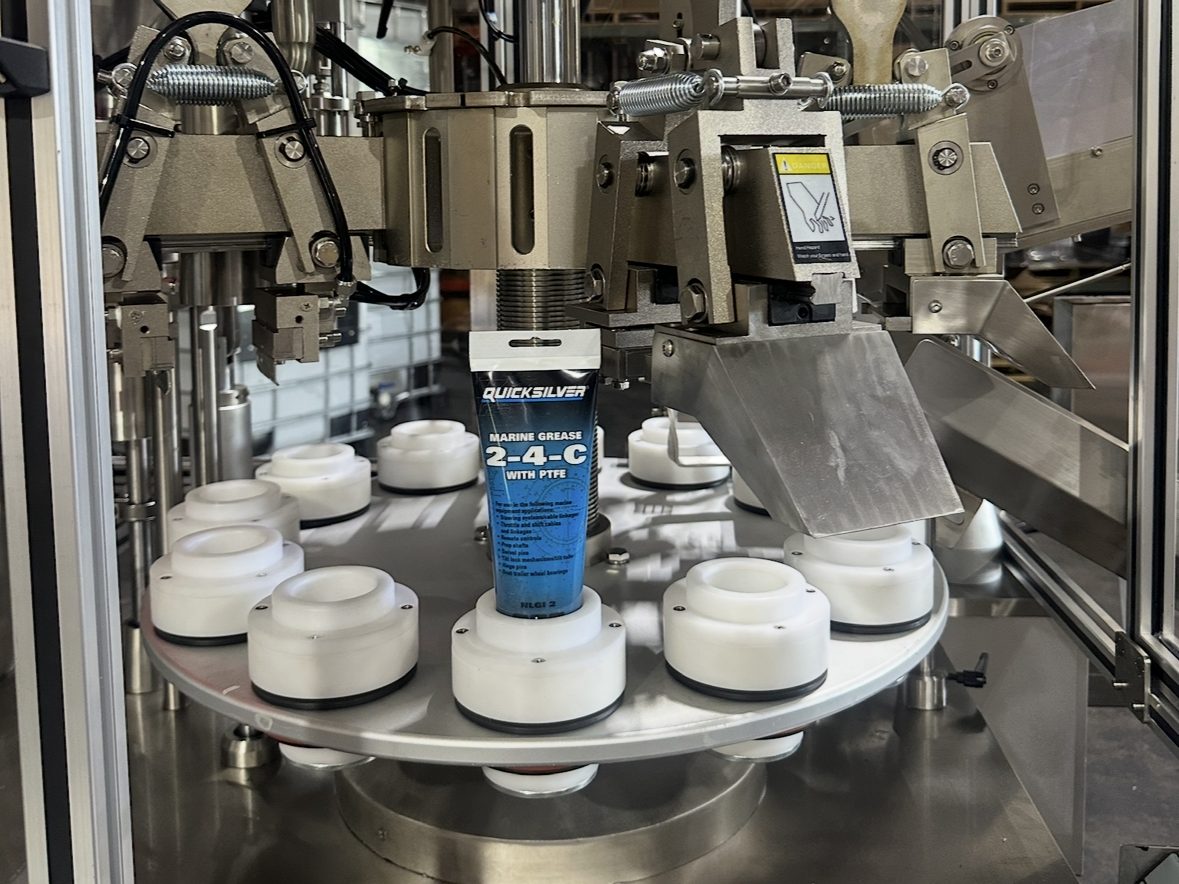 Printed squeeze tubes coming off the filling line